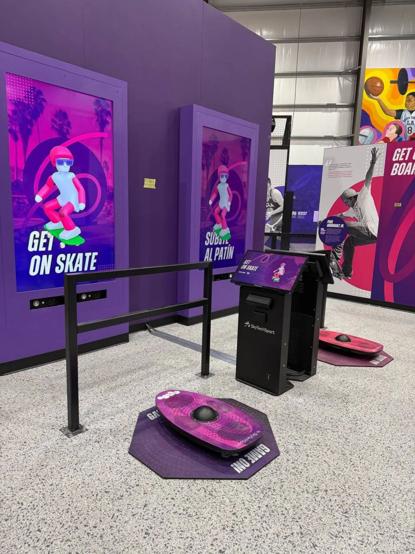 Children playing BalancePlay Pro on a dual-screen setup at a family entertainment center